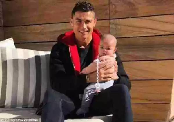 Football Star, Cristiano Ronaldo Cradles His Daughter Eva In New Photo.
